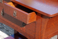 Dovetail drawer construction and accurate replica hardware.